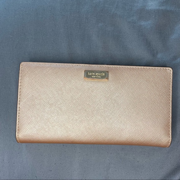 kate spade Handbags - Kate Spade staci large slim bifold wallet